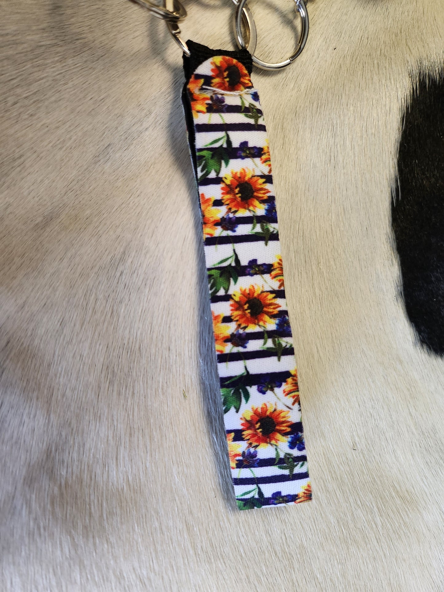 Self defense keychain with with sun flowers and yellowe pepper spray
